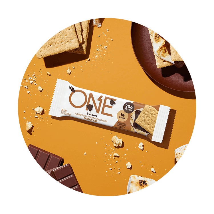 one bars smores flavored protein bar surrounded by flavor cues