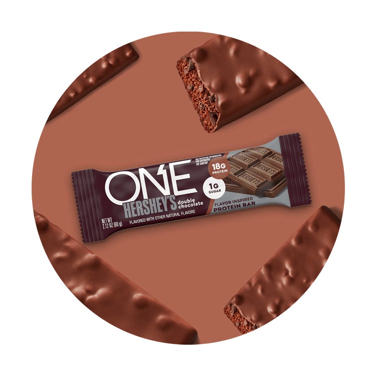 one hersheys double chocolate flavored protein bar surrounded by flavor cues