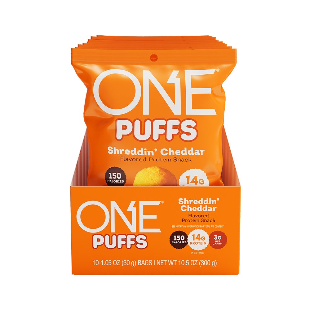 ONE PUFFS Shreddin’ Cheddar Flavored Protein Snack, 1.05 oz bag, 10 count box - Front of Package