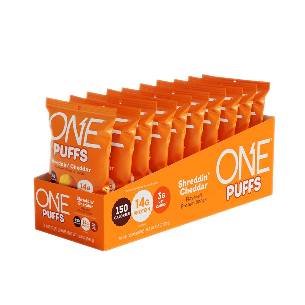 ONE PUFFS Shreddin’ Cheddar Flavored Protein Snack, 1.05 oz bag, 10 count box - Out of Package